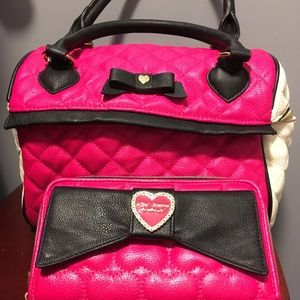 Betsy Johnson handbag with matching wallet.